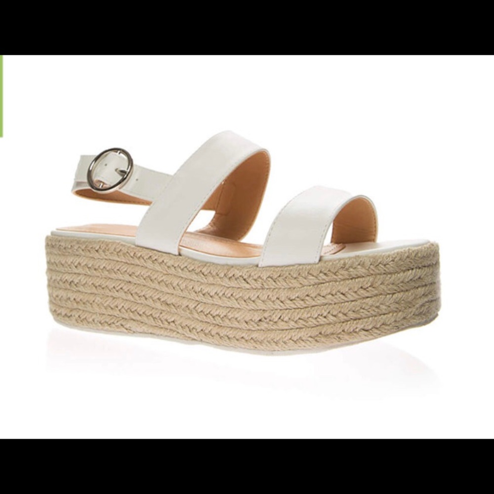 This is a white platform sandals from Go Jane